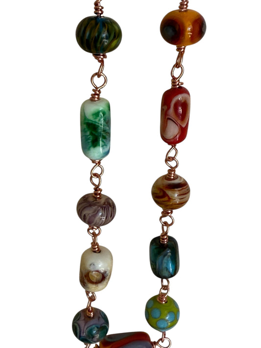 Lampworked beads on copper