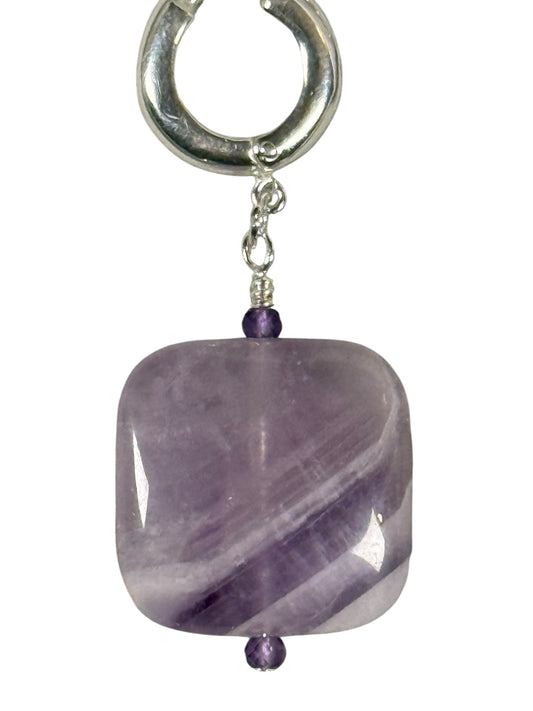 #144-Amethyst Earrings on SS Huggie