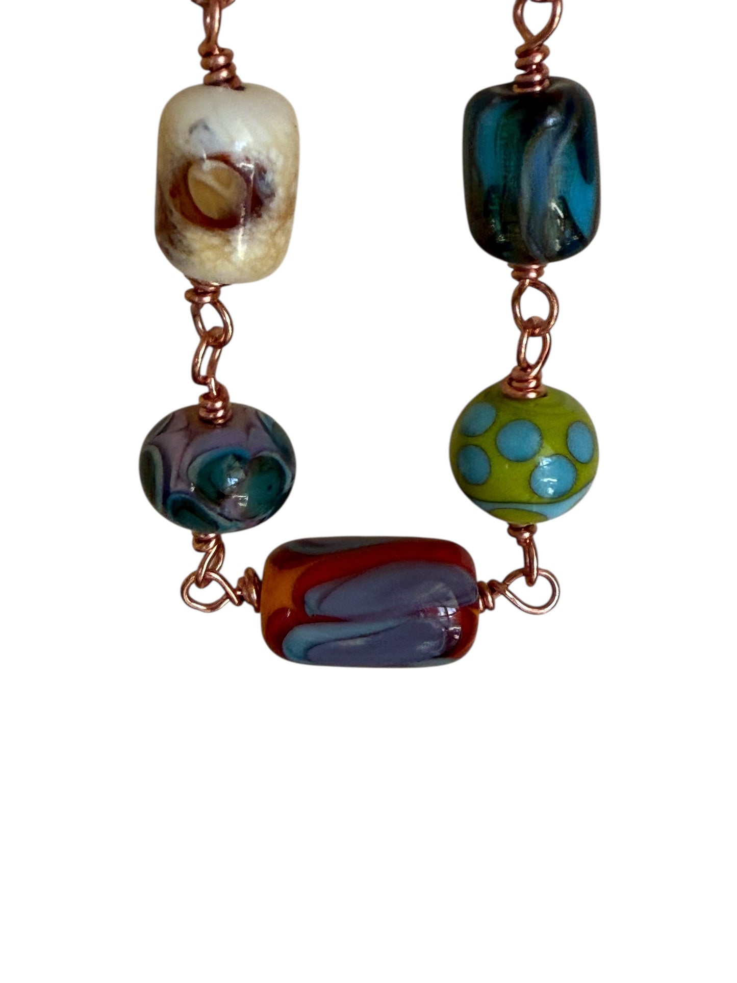 Lampworked beads on copper