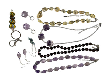 #144-Amethyst Earrings on SS Huggie