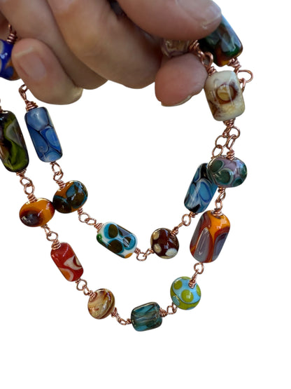 Lampworked beads on copper